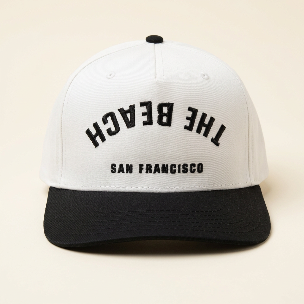 The Beach SF white and black Flip hat on an off-white background
