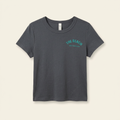 Denim-colored women's tee with teal The Beach chest logo, front