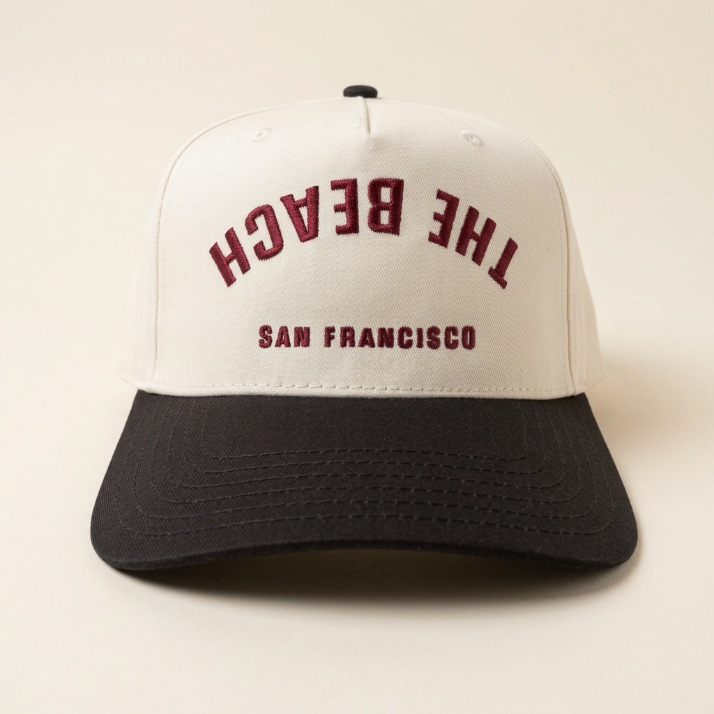 The Beach SF cream, black and maroon Flip hat on an off-white background
