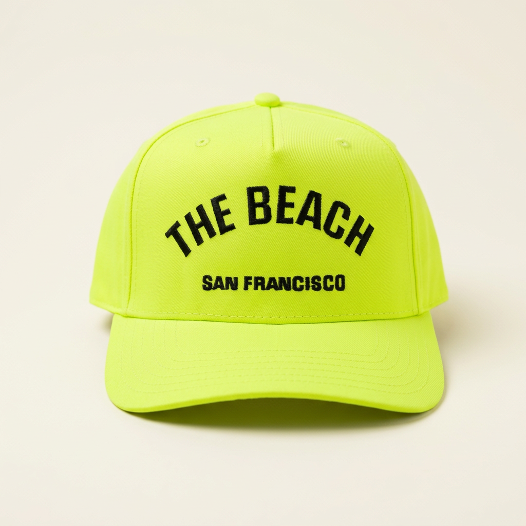 The Beach SF neon green hat on an off-white background
