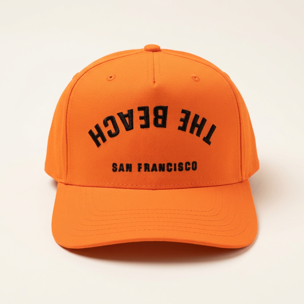 The Beach SF orange Flip hat on an off-white background
