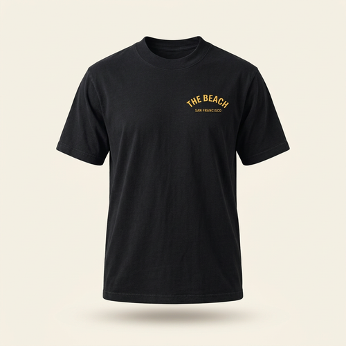 Black men's tee with yellow The Beach chest logo, front